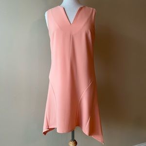 Fab’rik sleeveless dark peach/coral dress with asymmetrical hem. Size Medium